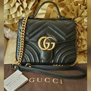 Authentic Gucci Black and Gold Crossbody Bag with Iconic GG Logo